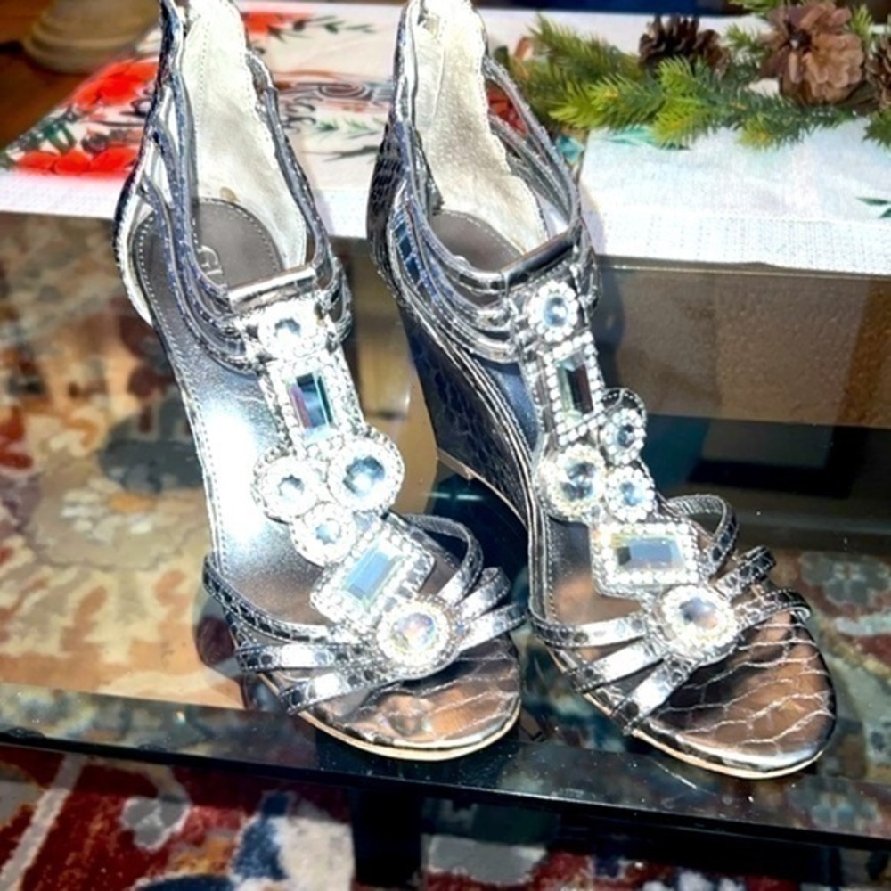 Guess heels about to 4inches, big rhinestones , bright and shiny
